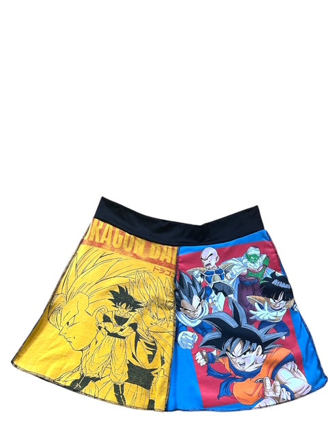 Skirt featuring a split Dragon Ball design, with a yellow and black print on the left side and a blue, red, and orange print on the right side, set against a plain white background.
